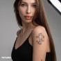 Tatuaż półtrwały kwitnący krzyż